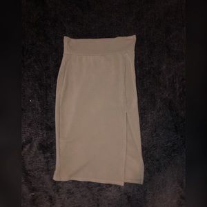 Olive green pencil skirt with a slit on the side